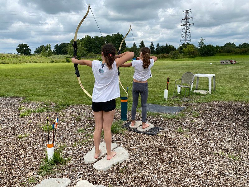 Children with bare feet during Homeschool Archery Program at Barefoot Bushcraft