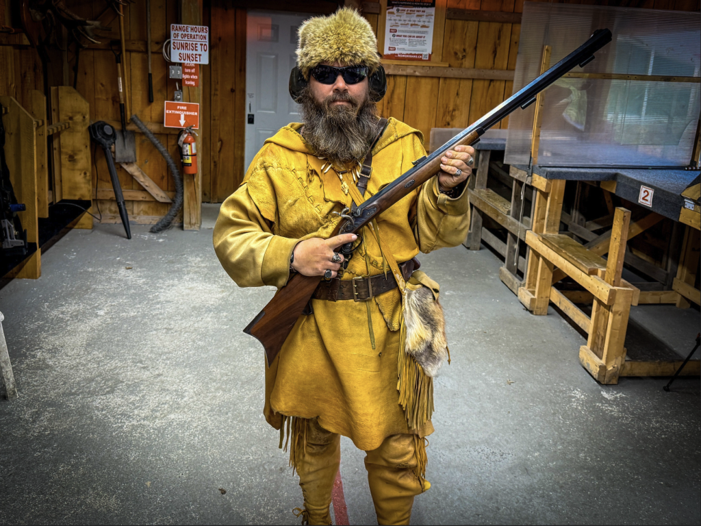 Wilkolaak with Amber Necklace and Hawken Rifle